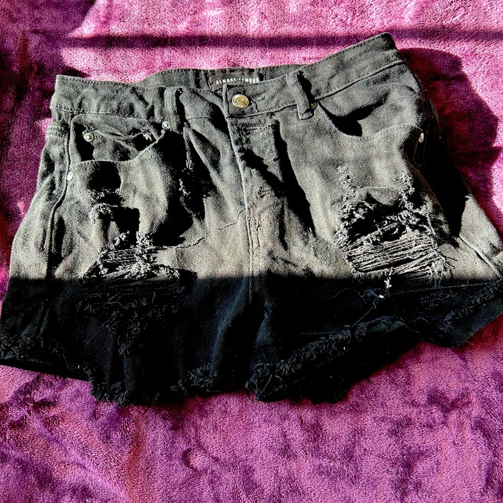 Distressed black shorts